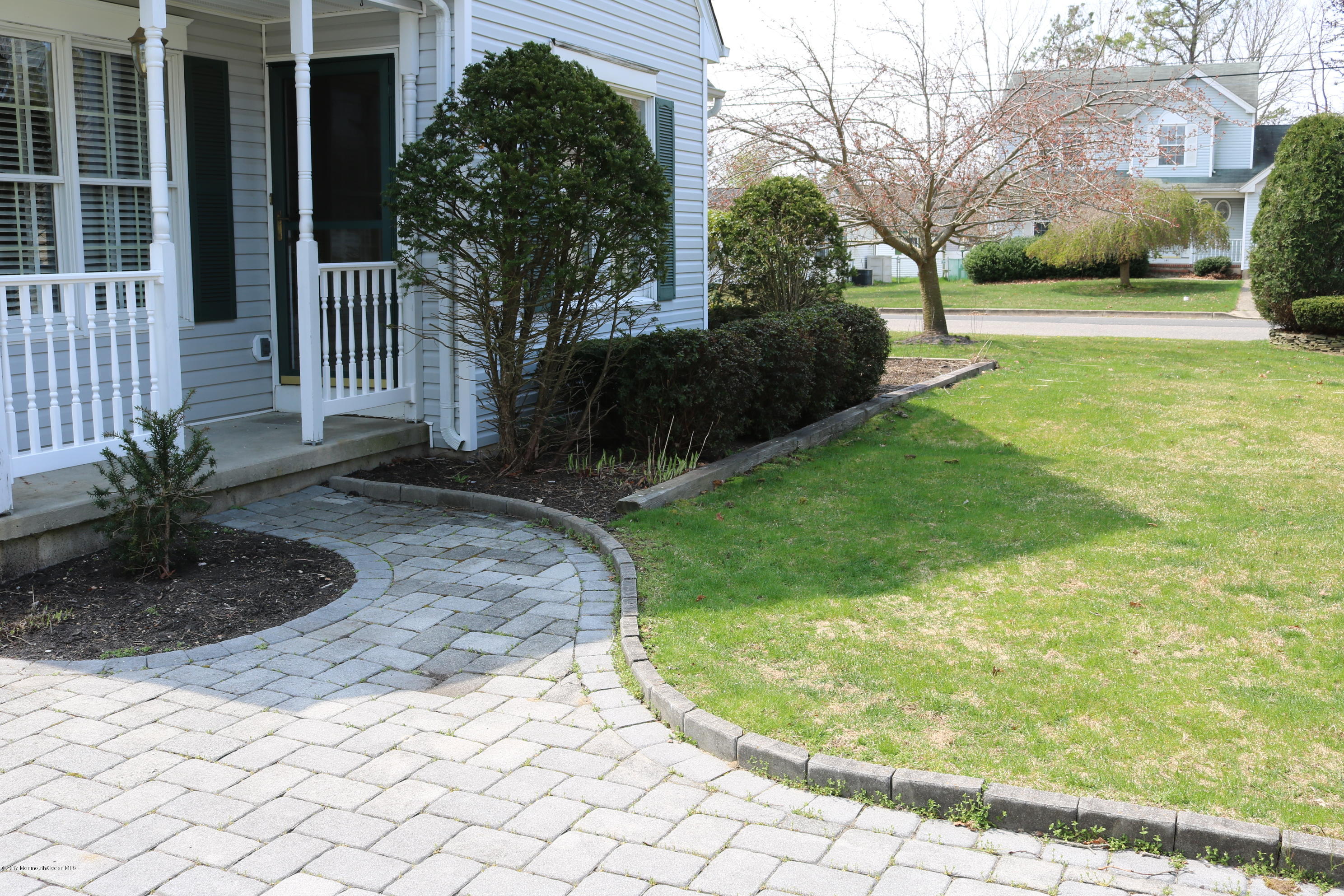 164 Equinox Road Manahawkin, NJ 08050 - Photo 31 of 35 a view of a backyard with a small cabin