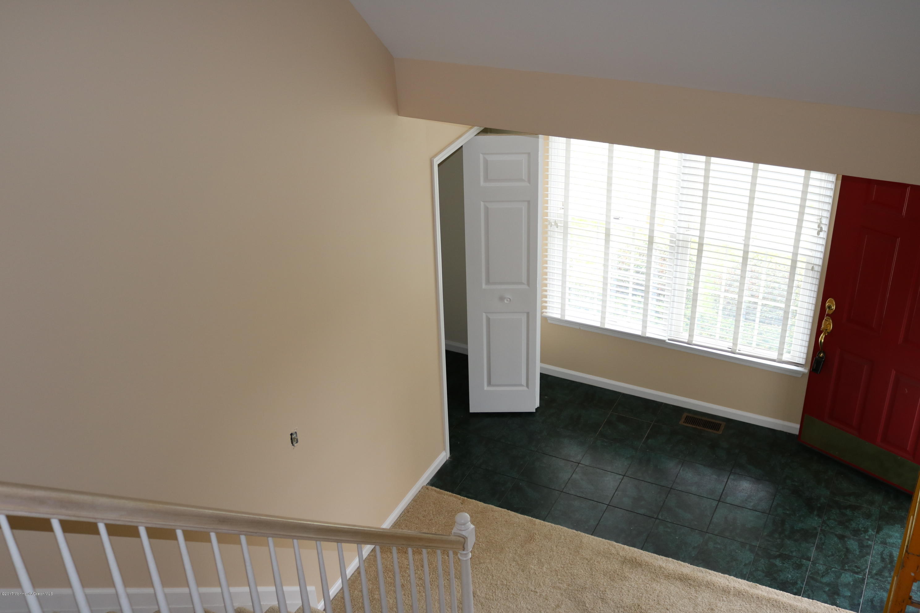 164 Equinox Road Manahawkin, NJ 08050 - Photo 8 of 35 a view of an empty room and window