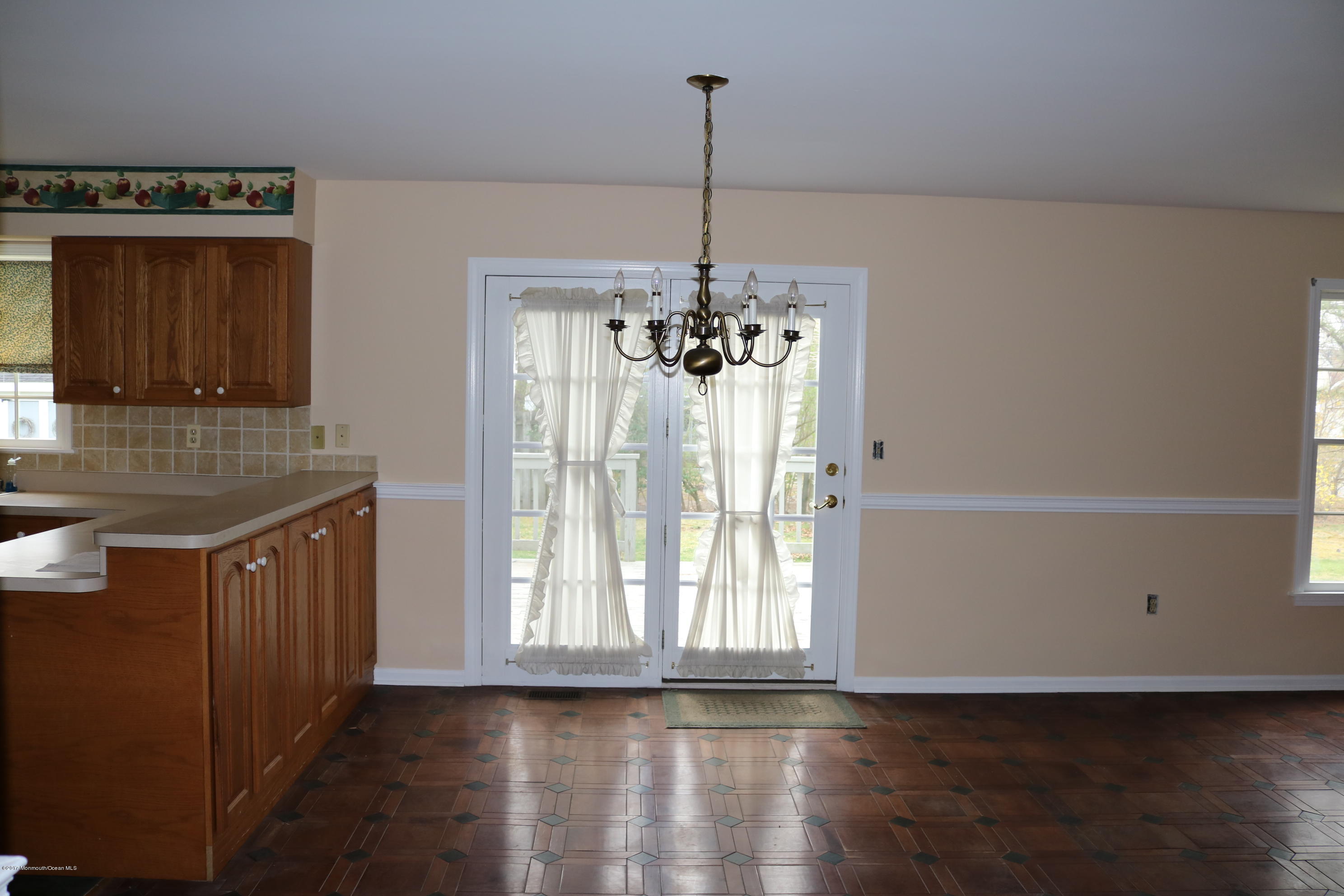 164 Equinox Road Manahawkin, NJ 08050 - Photo 10 of 35 a kitchen with a refrigerator and a sink