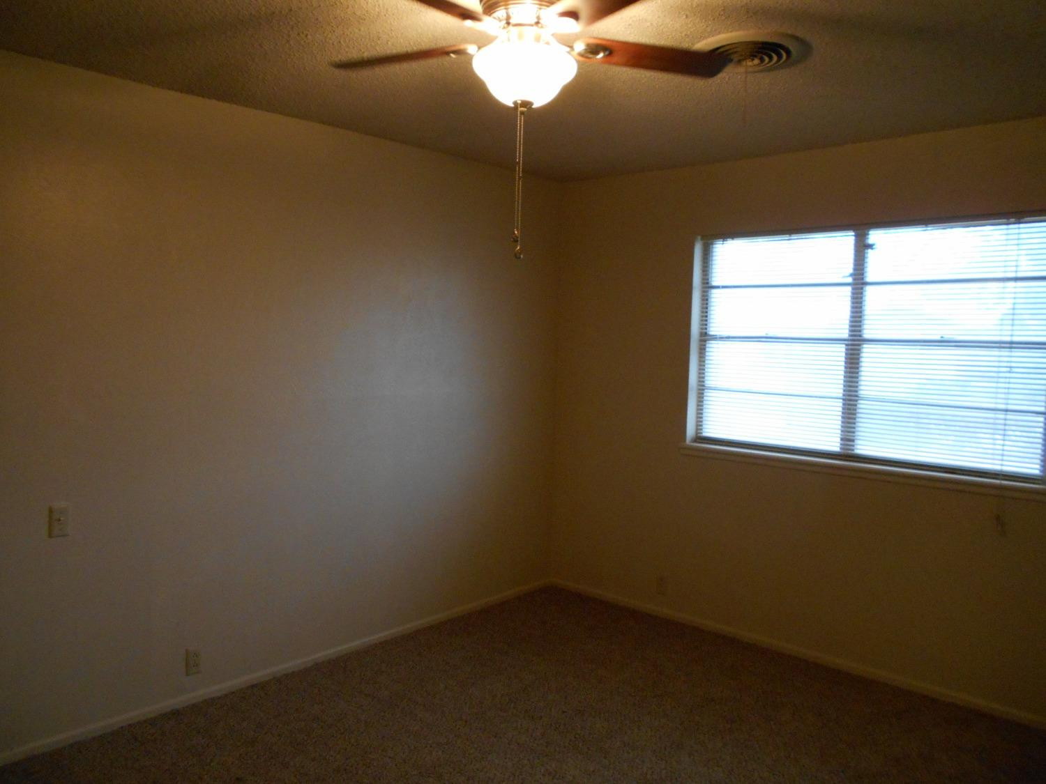 5401 14th Street Lubbock, TX 79416 - Photo 11 of 17 a view of a room with a window