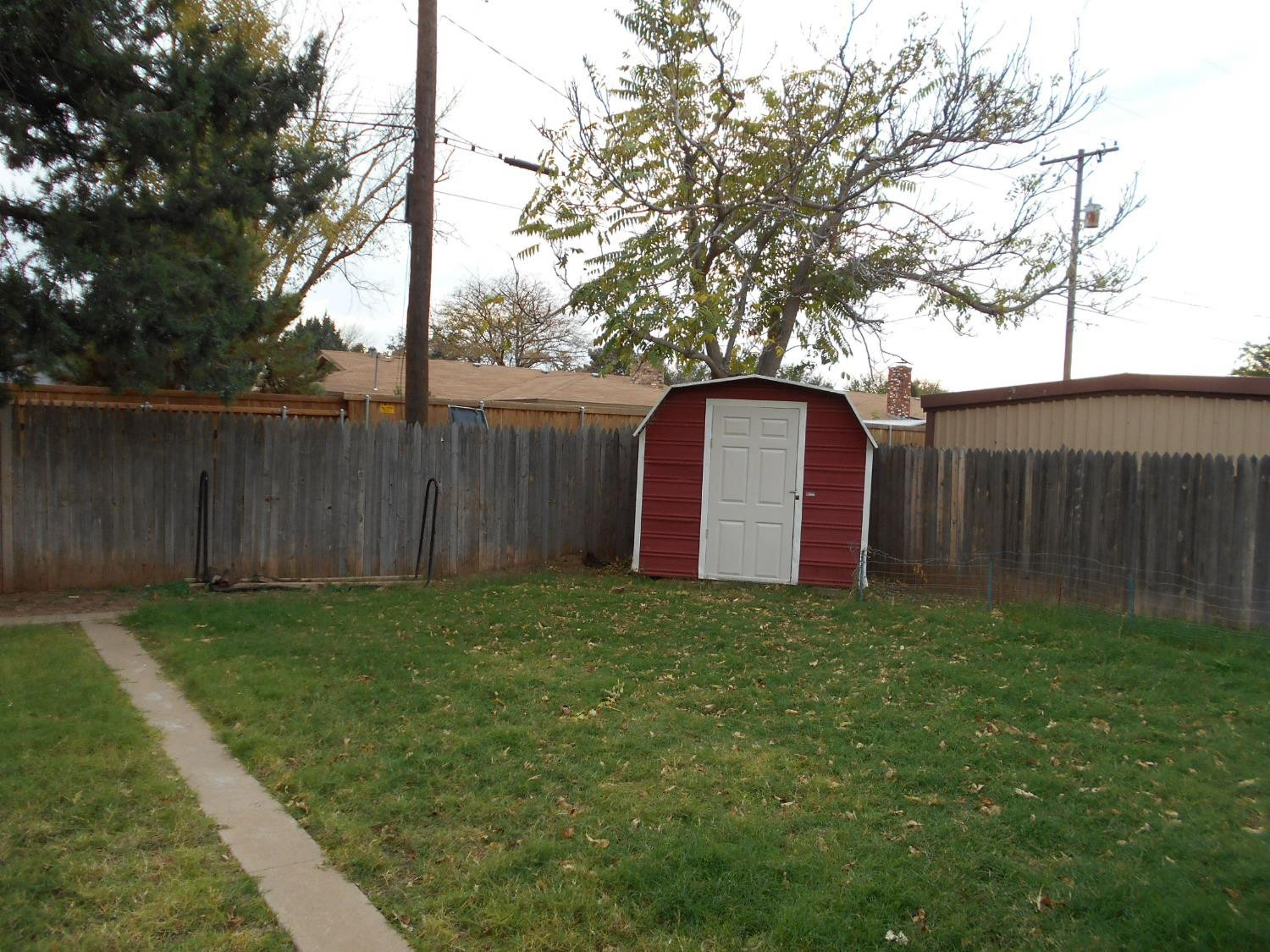5401 14th Street Lubbock, TX 79416 - Photo 15 of 17 a view of a backyard