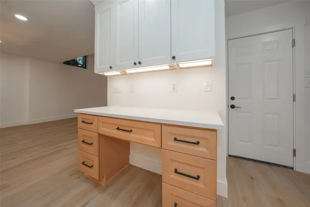 a kitchen with stainless steel appliances a refrigerator and a sink