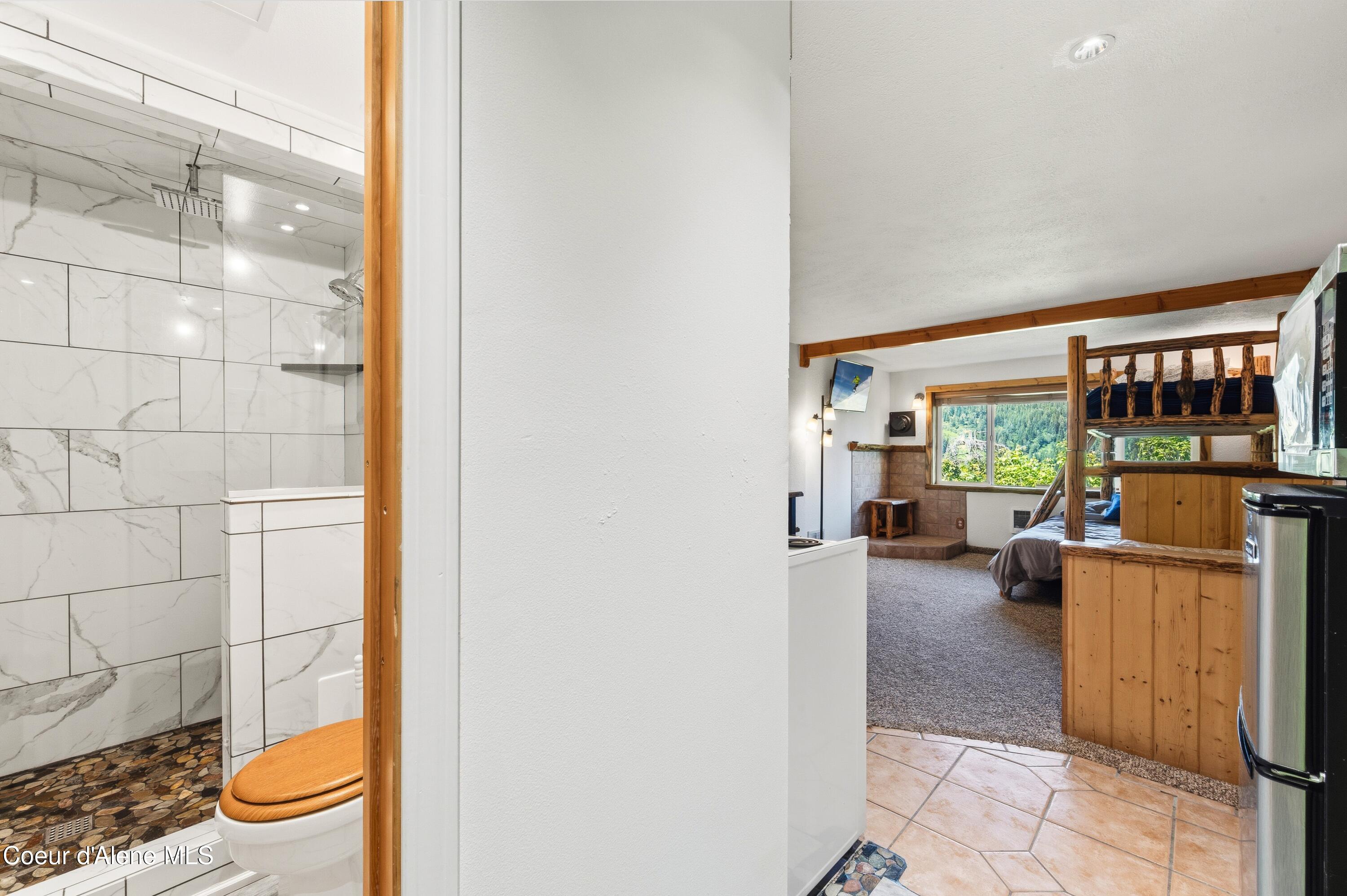 216 Mogul Hill Road, Unit 102 Sandpoint, ID 83864 - Photo 20 of 60 Bathroom Into Living