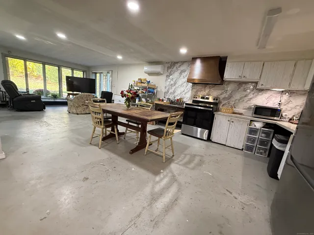 a bathroom with a sink a mirror and a toilet