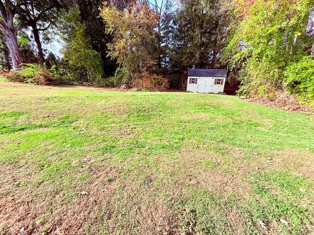 a house view with a garden space