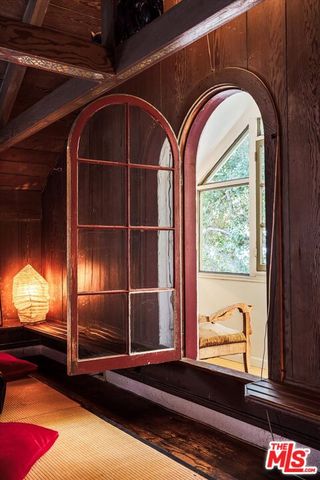 a view of a entryway door with wooden floor