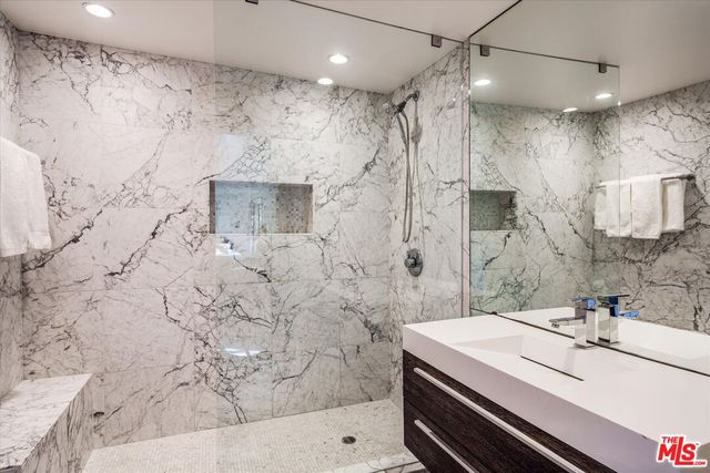 a view of a wooden deck with a bench