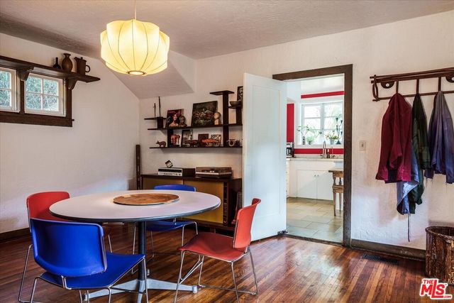 a very nice looking room with a desk and a window