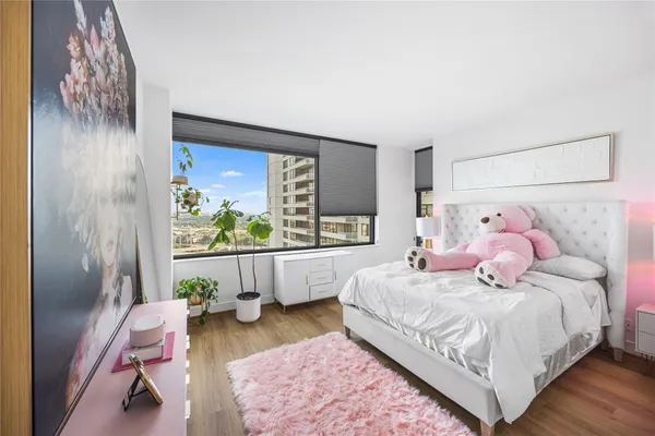 a view of a hallway with washer and dryer