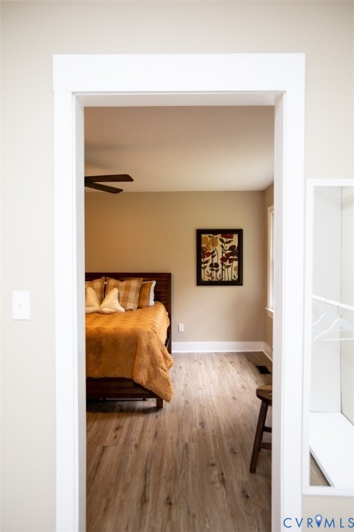 3153 West 3rd Street Farmville, VA 23901 - Photo 27 of 63 a view of a bedroom with wooden floor and bathroom