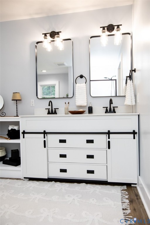 3153 West 3rd Street Farmville, VA 23901 - Photo 36 of 63 a bathroom with a double vanity sink mirror and