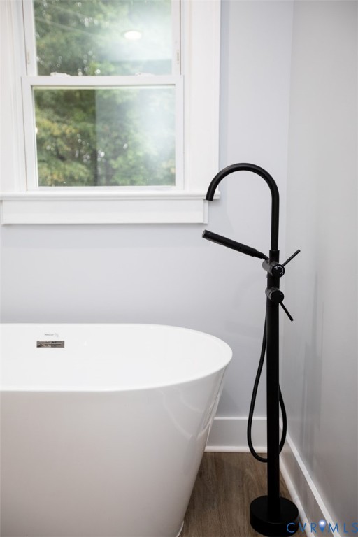 3153 West 3rd Street Farmville, VA 23901 - Photo 44 of 63 a white bath tub sitting in a bathroom
