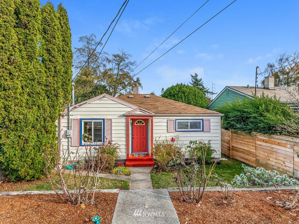 9222 12th Avenue Southwest Seattle, WA 98106 - Photo 1 of 30 a front view of a house with garden