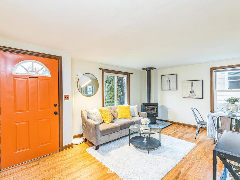 9222 12th Avenue Southwest Seattle, WA 98106 - Photo 3 of 30 a living room with furniture and a window