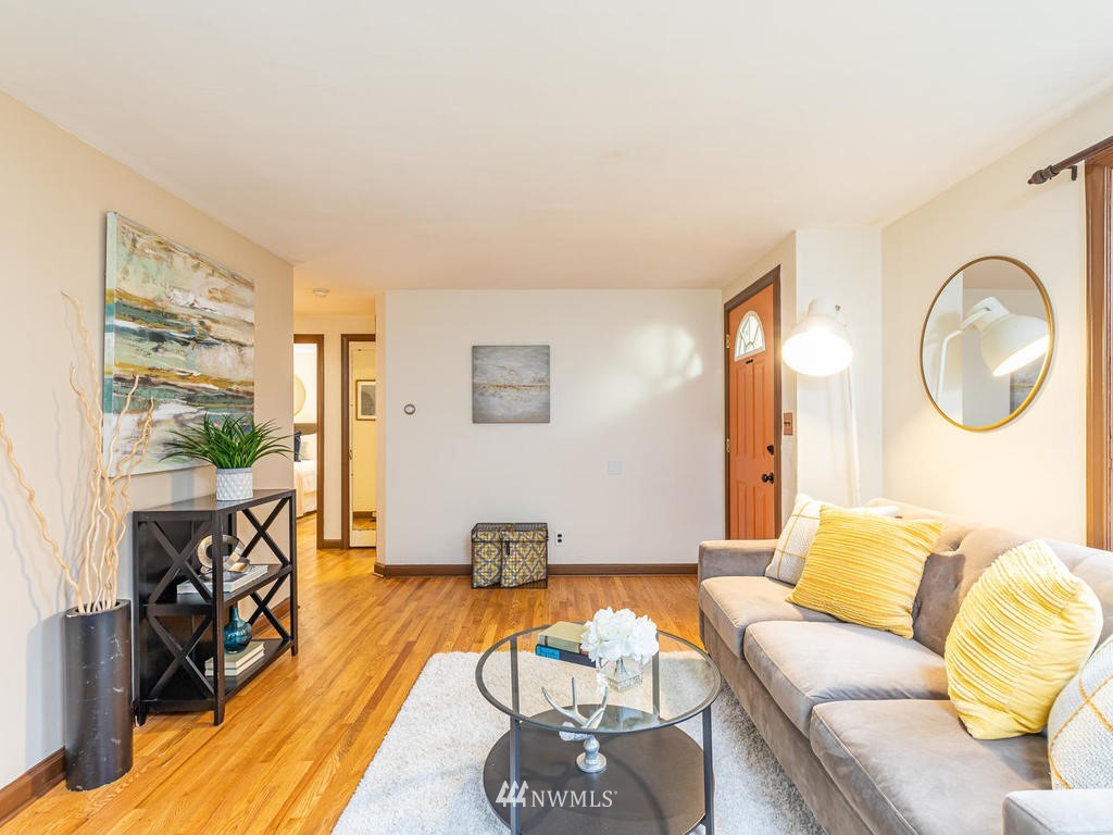 9222 12th Avenue Southwest Seattle, WA 98106 - Photo 5 of 30 a living room with furniture and a large window