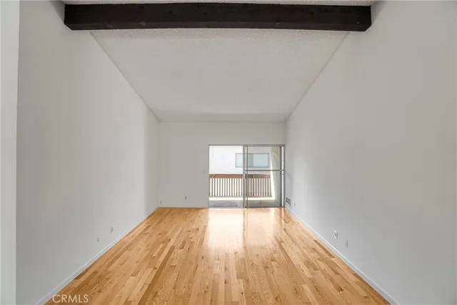 a kitchen with a stove and a refrigerator