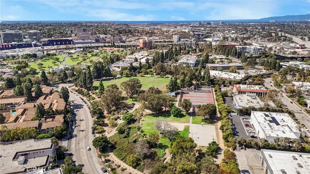 an aerial view of a city with lots of residential buildings