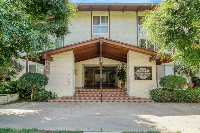 a front view of a house with a garage