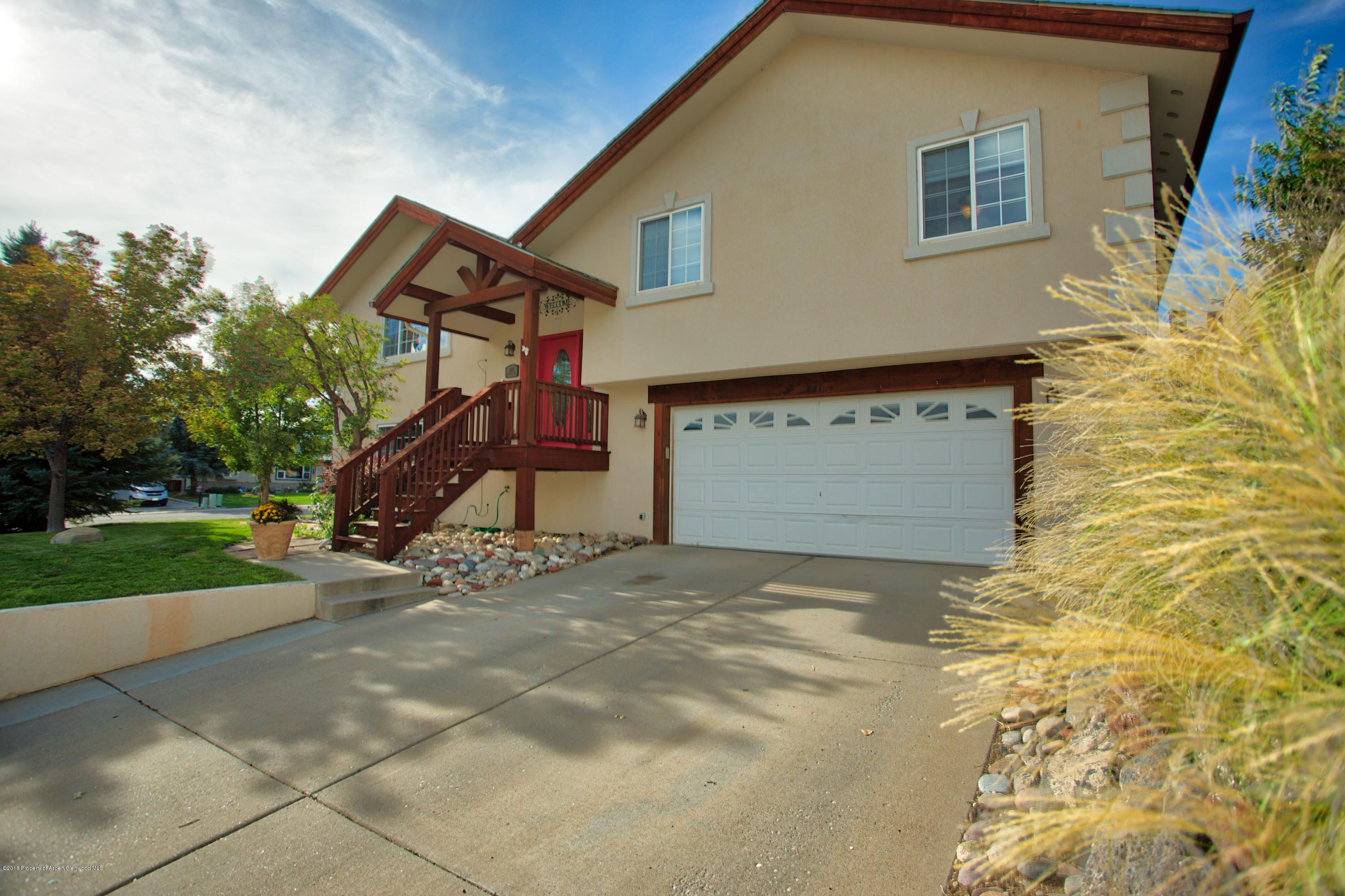 841 Hickory Drive Rifle, CO 81650 - Photo 1 of 20 a view of a house with a park