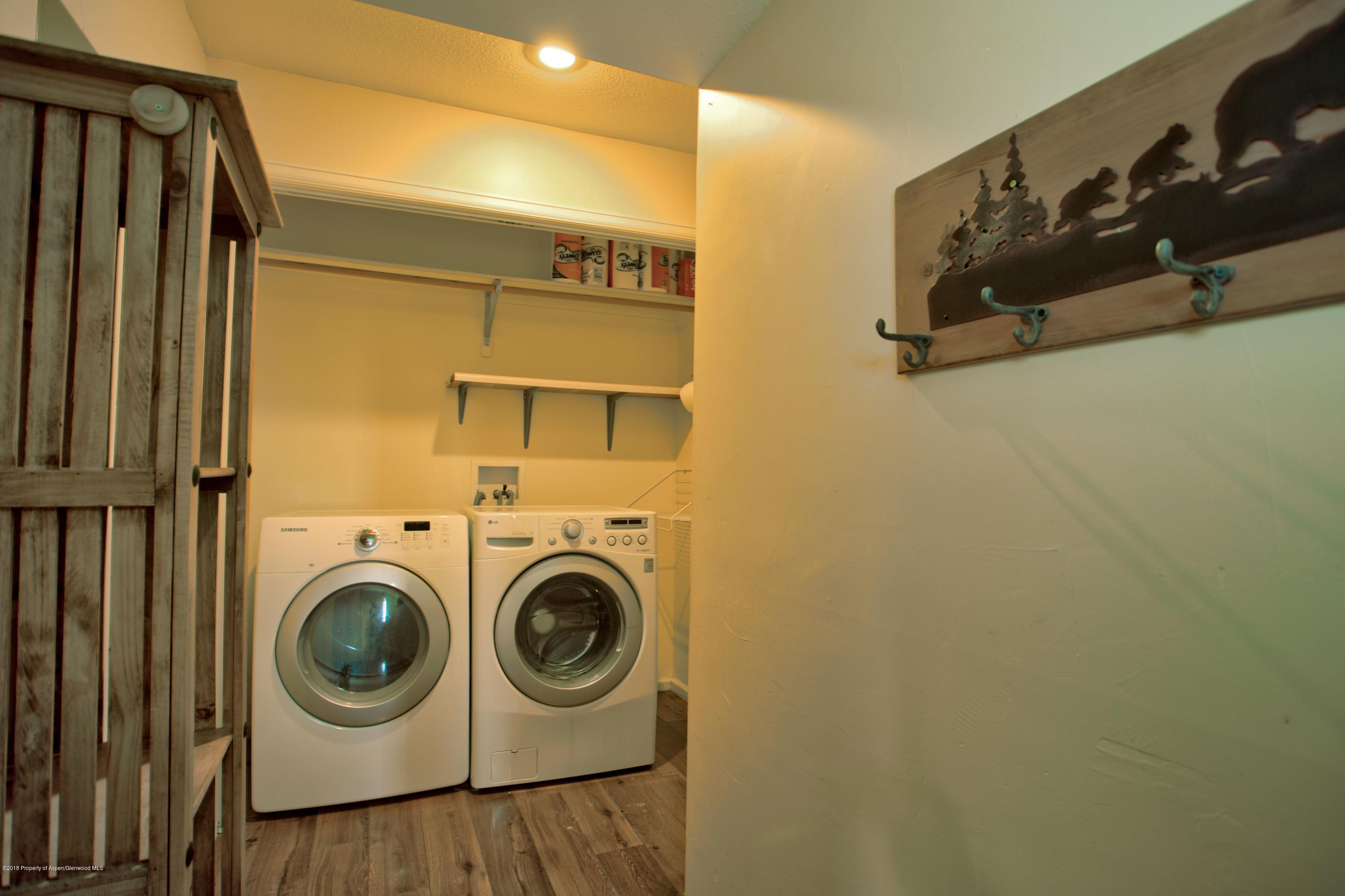 841 Hickory Drive Rifle, CO 81650 - Photo 17 of 20 a utility room with dryer and washer