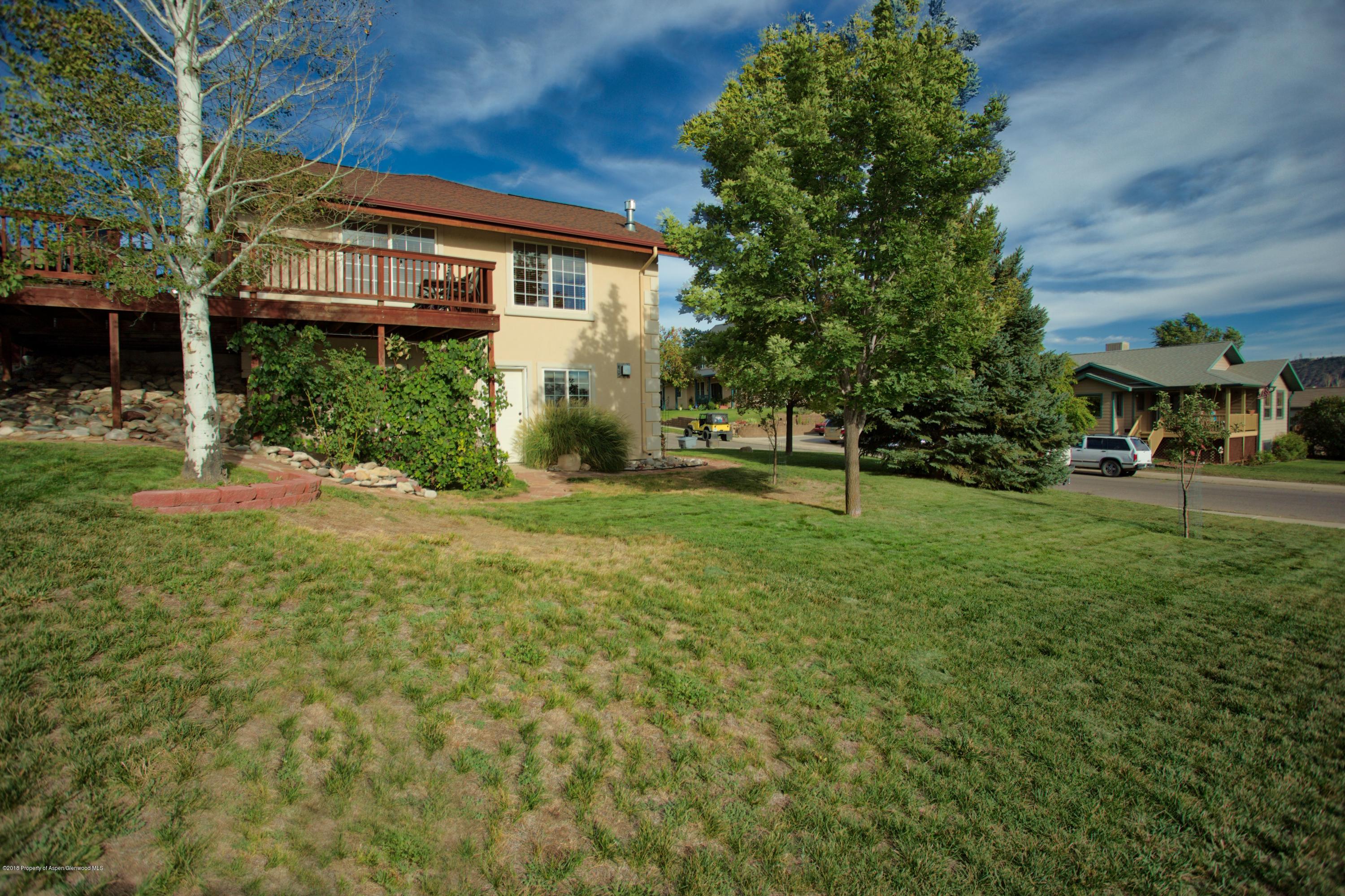 841 Hickory Drive Rifle, CO 81650 - Photo 3 of 20 a view of a house with a yard