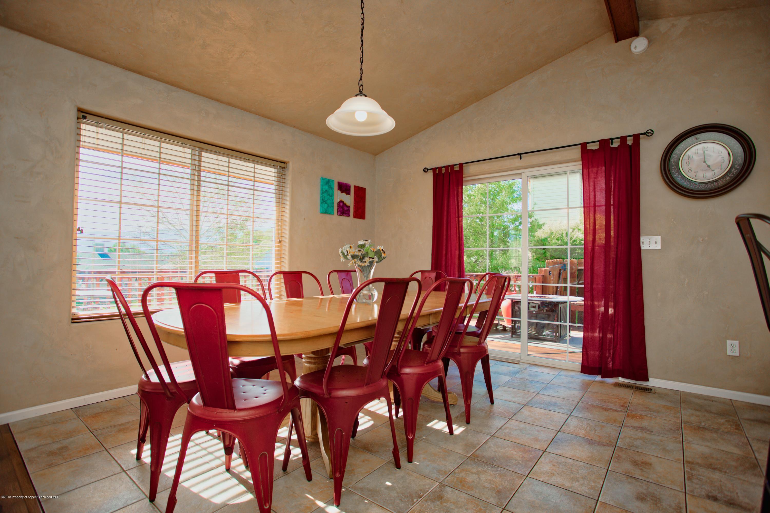 841 Hickory Drive Rifle, CO 81650 - Photo 8 of 20 a dining room with furniture and window
