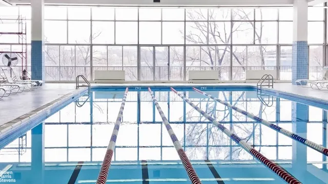 an aerial view of a city with lake view