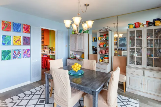 a kitchen with granite countertop a sink cabinets and window