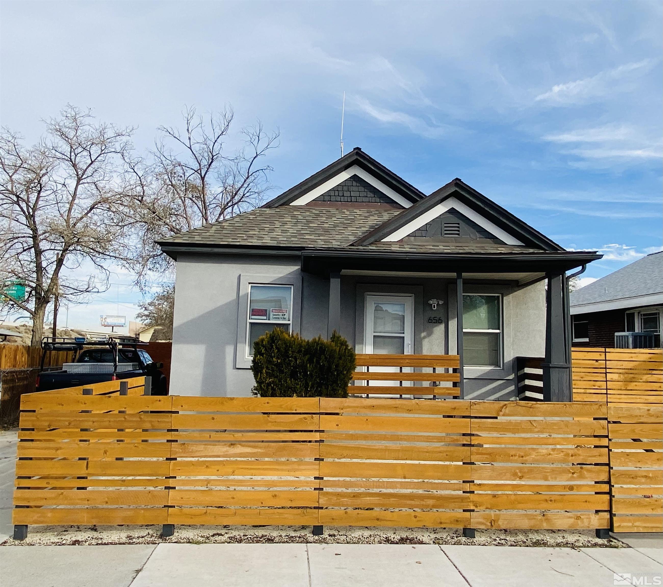 656 Spokane Street Reno, NV 89512 - Photo 1 of 31 a view of a house with a swimming pool
