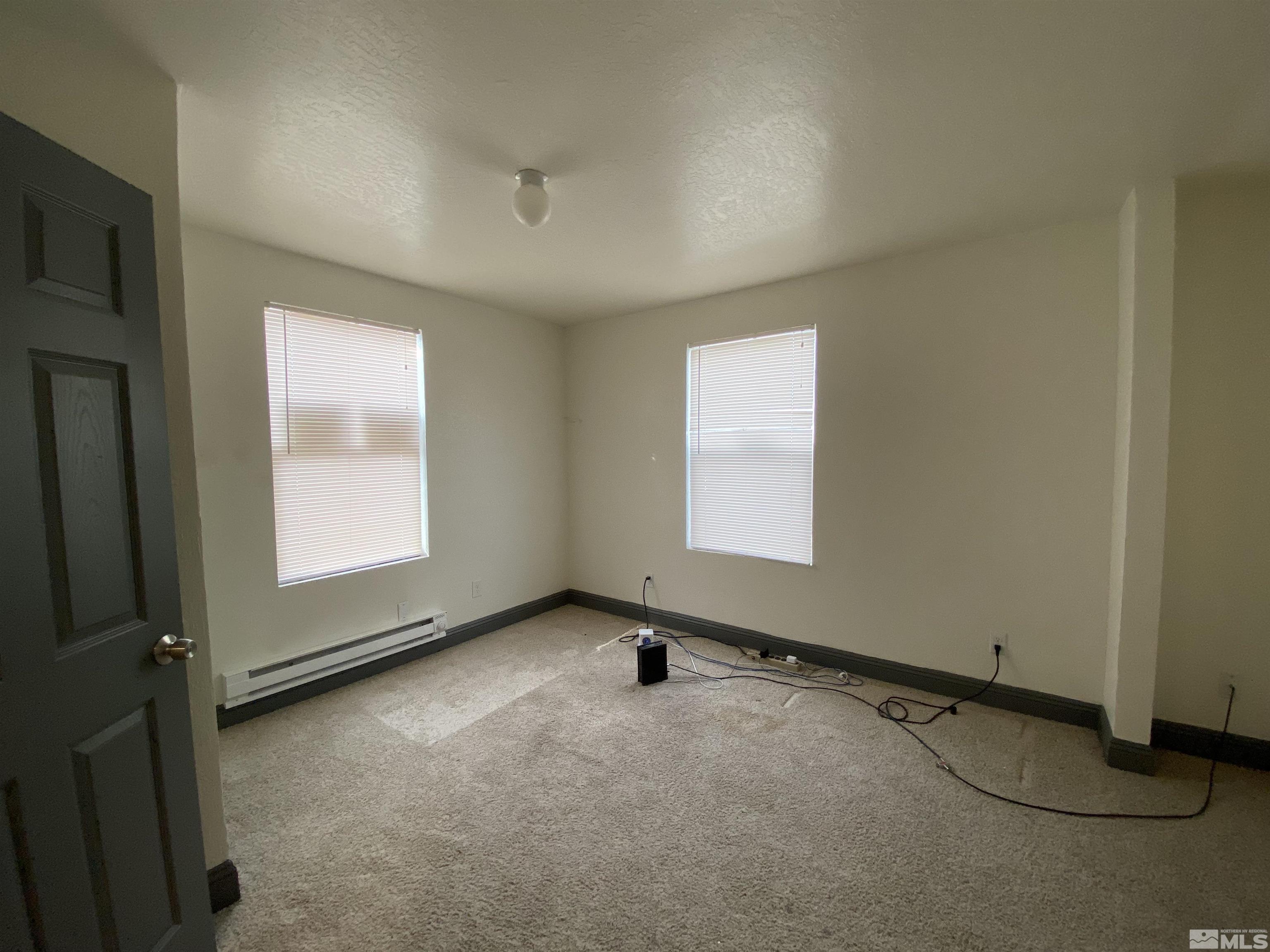 656 Spokane Street Reno, NV 89512 - Photo 14 of 31 an empty room with windows