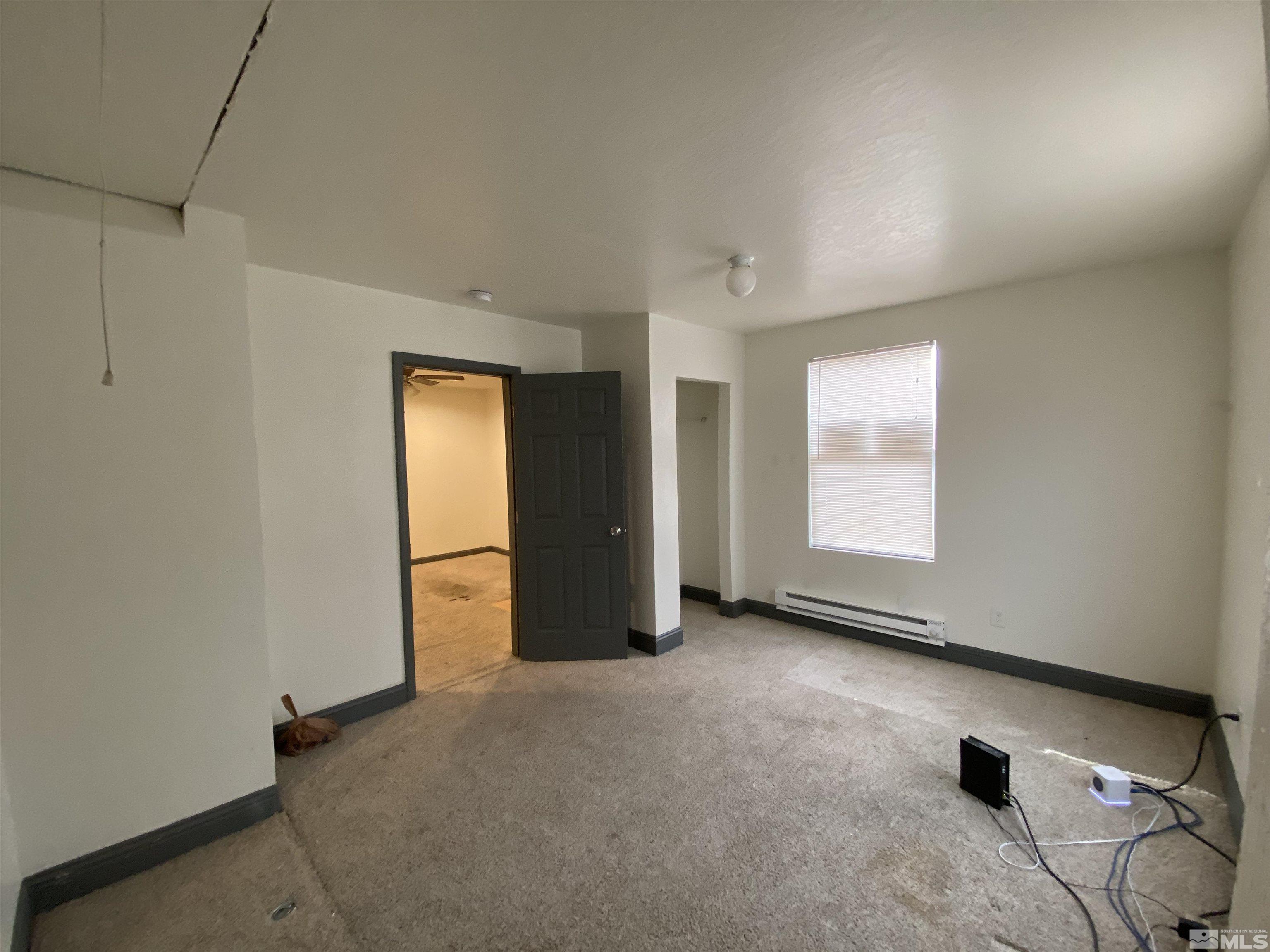 656 Spokane Street Reno, NV 89512 - Photo 15 of 31 an empty room with windows