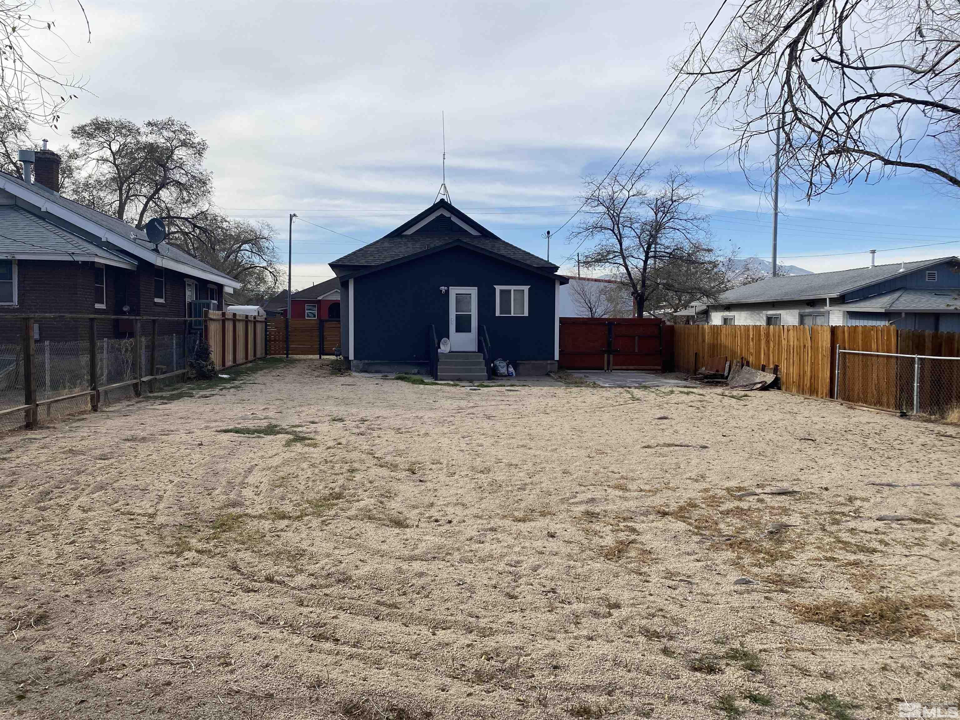 656 Spokane Street Reno, NV 89512 - Photo 28 of 31 a view of a house with a yard