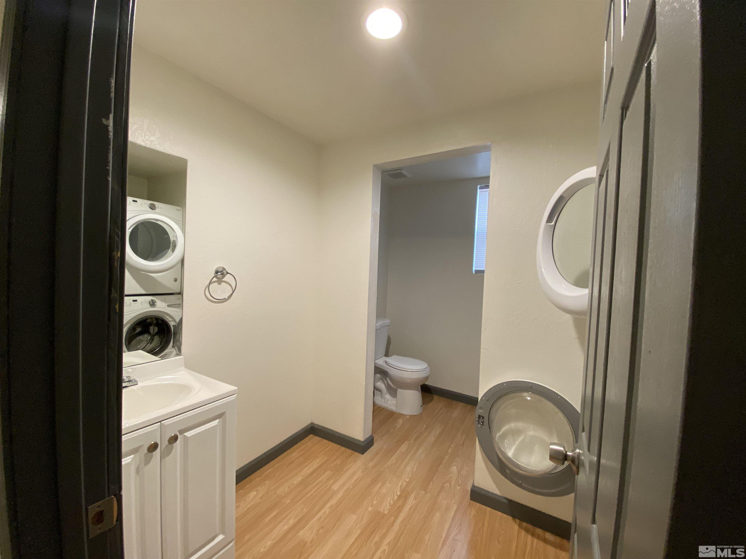 656 Spokane Street Reno, NV 89512 - Photo 8 of 31 a bathroom with a toilet and a sink