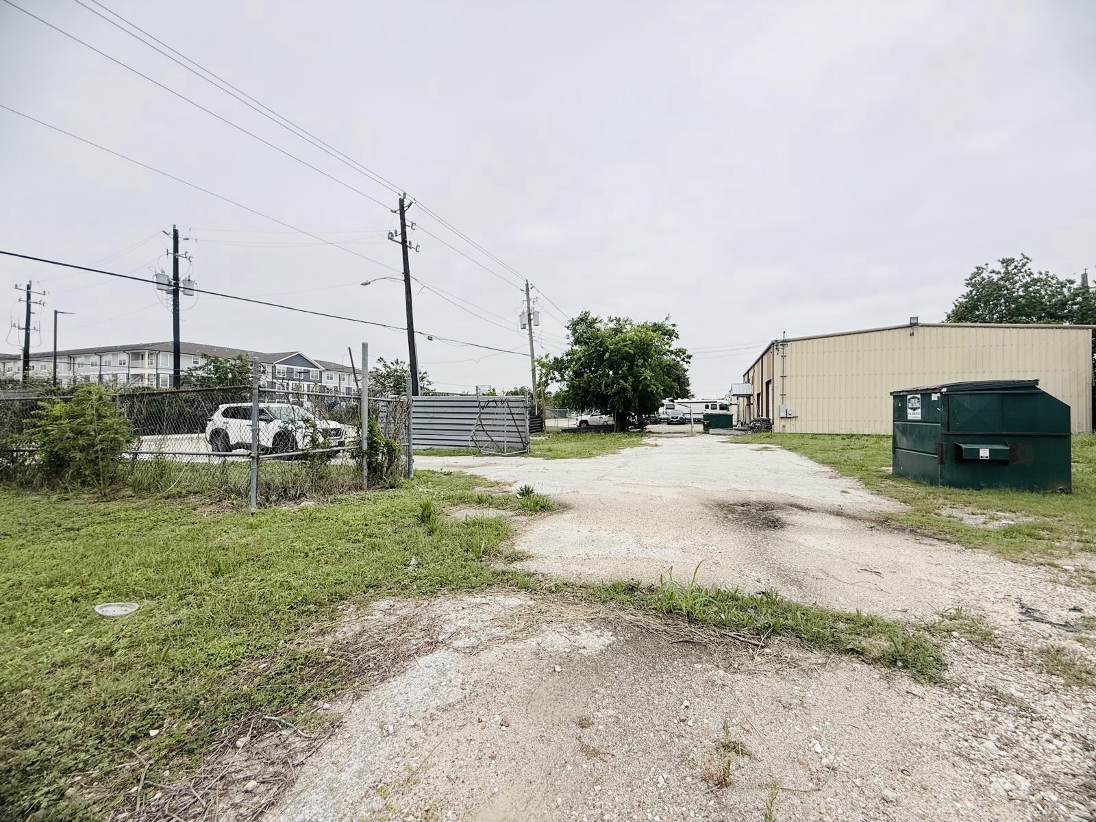 3910 Anderson Road Houston, TX 77053 - Photo 3 of 9 a view of a yard with a car park