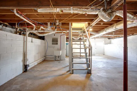 a view of a room with wooden racks