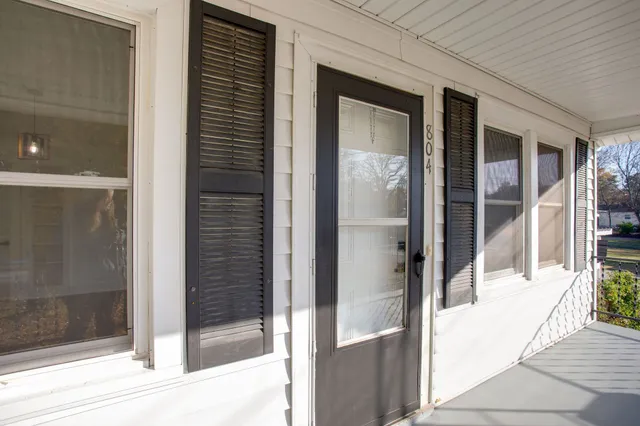 a view of house with yard