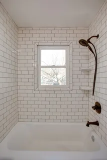 a view of a house with a yard and garage