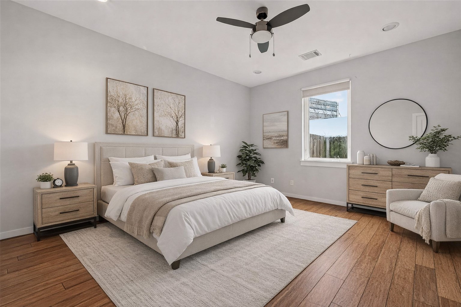 1819 South Street Houston, TX 77009 - Photo 4 of 27 a bedroom with a bed mirror and window
