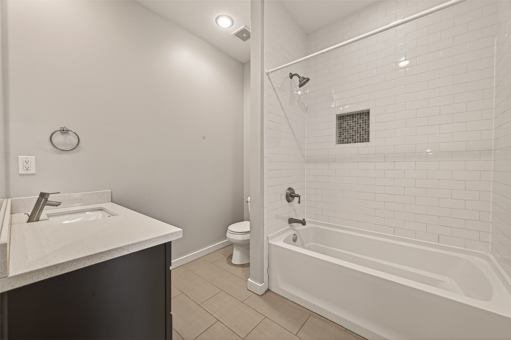 1819 South Street Houston, TX 77009 - Photo 6 of 27 a bathroom with a bathtub shower sink vanity and toilet