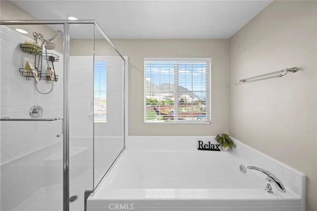 an aerial view of a residential houses with outdoor space