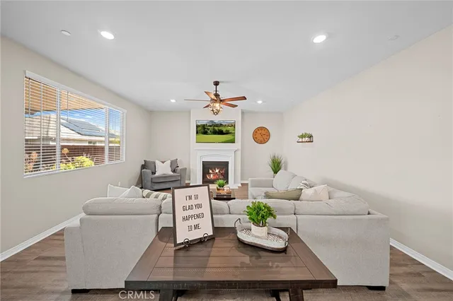 a living room with furniture and a table