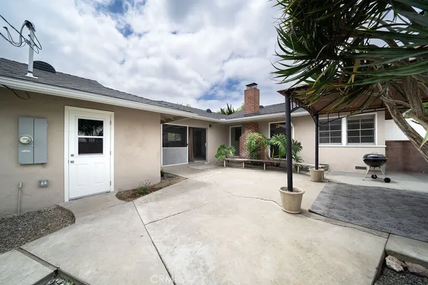 a house view with a garden space