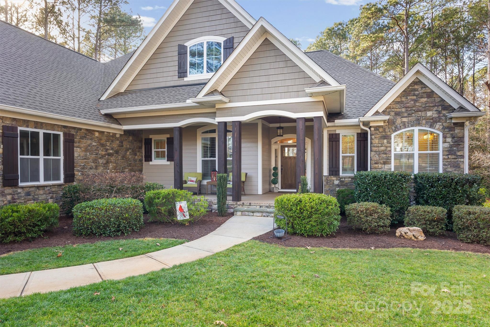 4221 Persimmon Road Lancaster, SC 29720 - Photo 2 of 48 a view of a big house with a big yard and potted plants