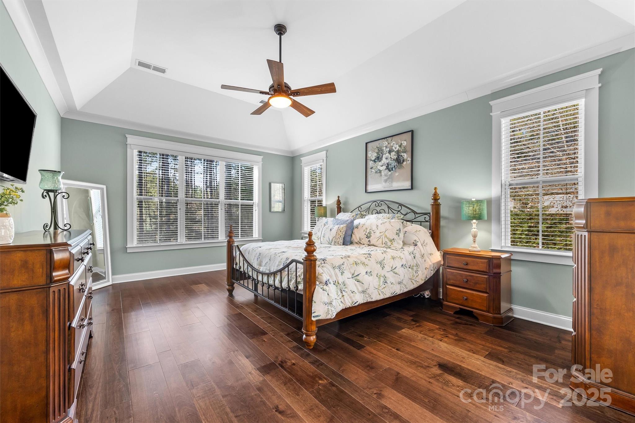 4221 Persimmon Road Lancaster, SC 29720 - Photo 23 of 48 a bedroom with a bed wooden floor and a window