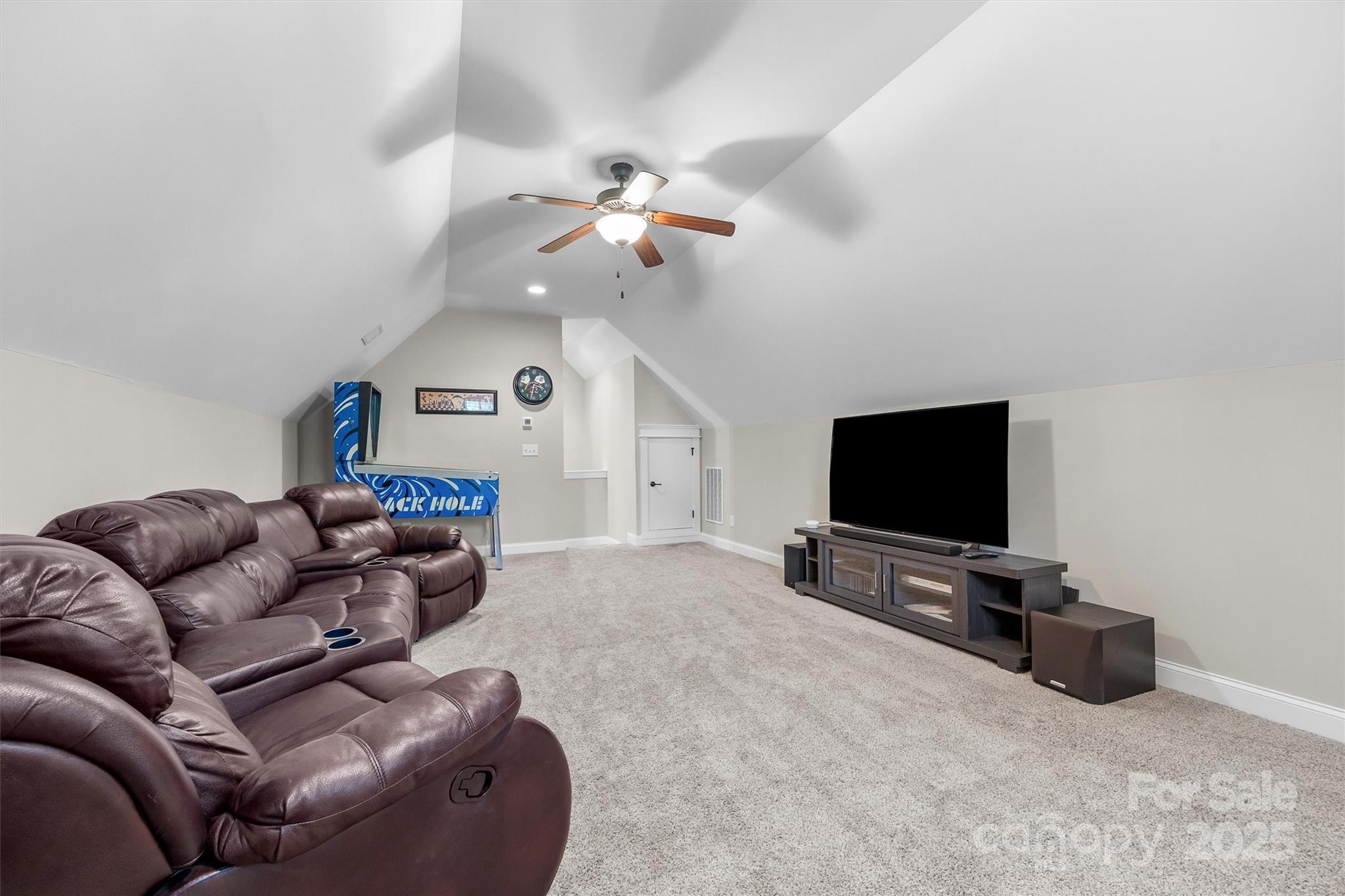 4221 Persimmon Road Lancaster, SC 29720 - Photo 29 of 48 a living room with furniture and a flat screen tv