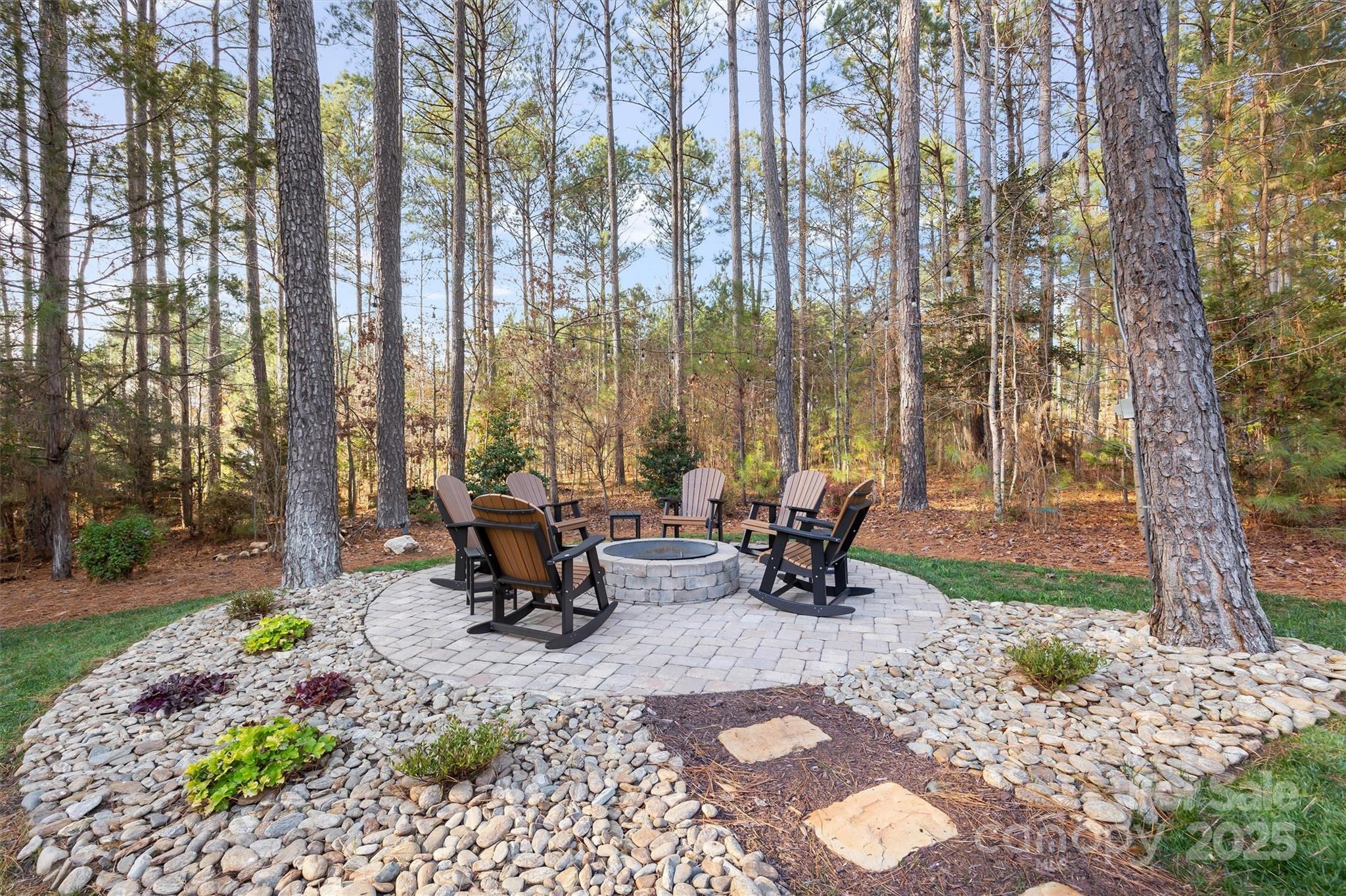 4221 Persimmon Road Lancaster, SC 29720 - Photo 37 of 48 a view of a backyard with sitting area