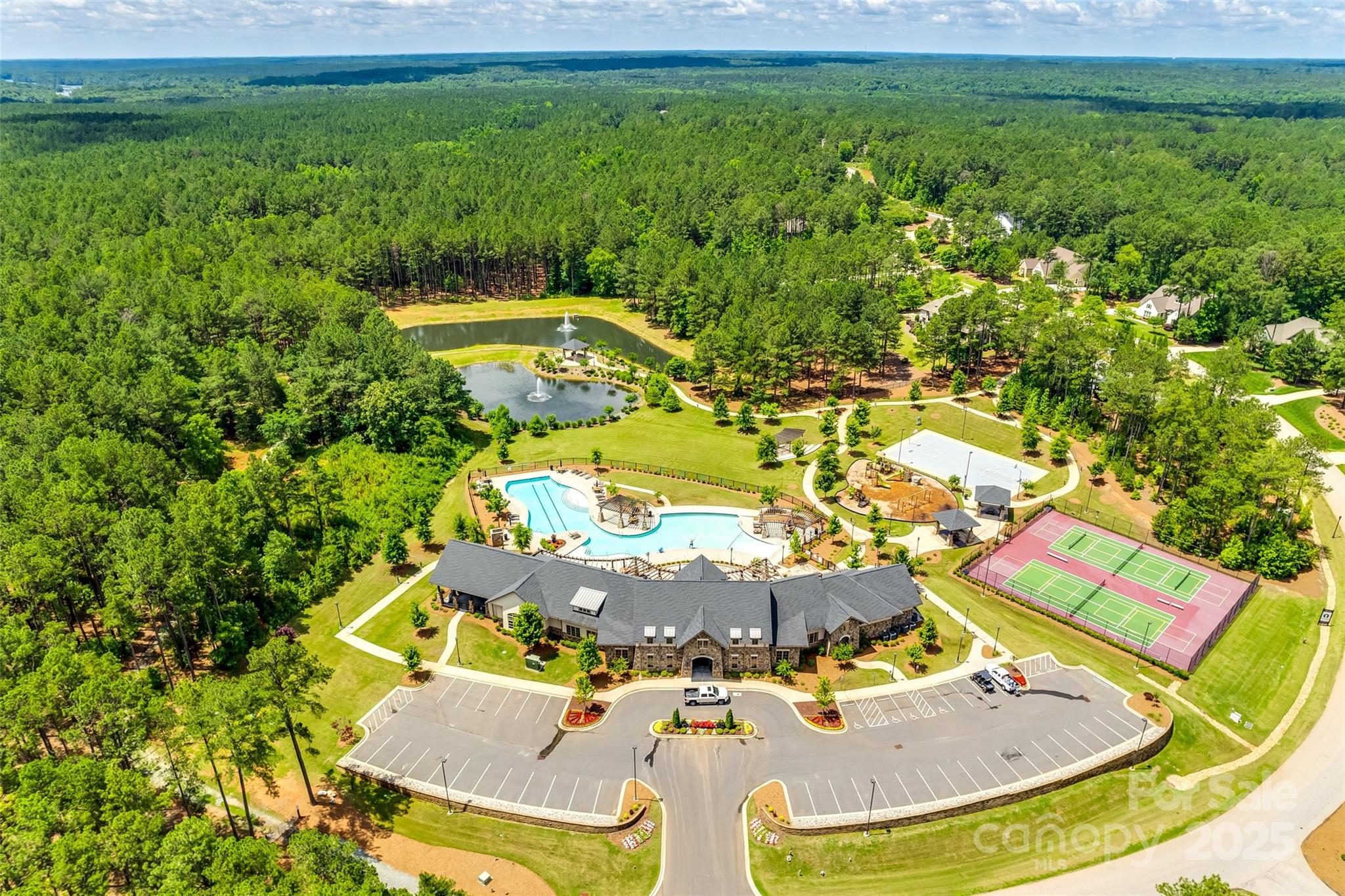 4221 Persimmon Road Lancaster, SC 29720 - Photo 42 of 48 an aerial view of a house with a swimming pool and garden view