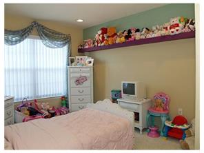 2 Mioduski Court Parlin, NJ 08859 - Photo 4 of 10 a bedroom with a bed and a dresser in it