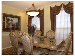 2 Mioduski Court Parlin, NJ 08859 - Photo 6 of 10 a view of a dining room with furniture and chandelier