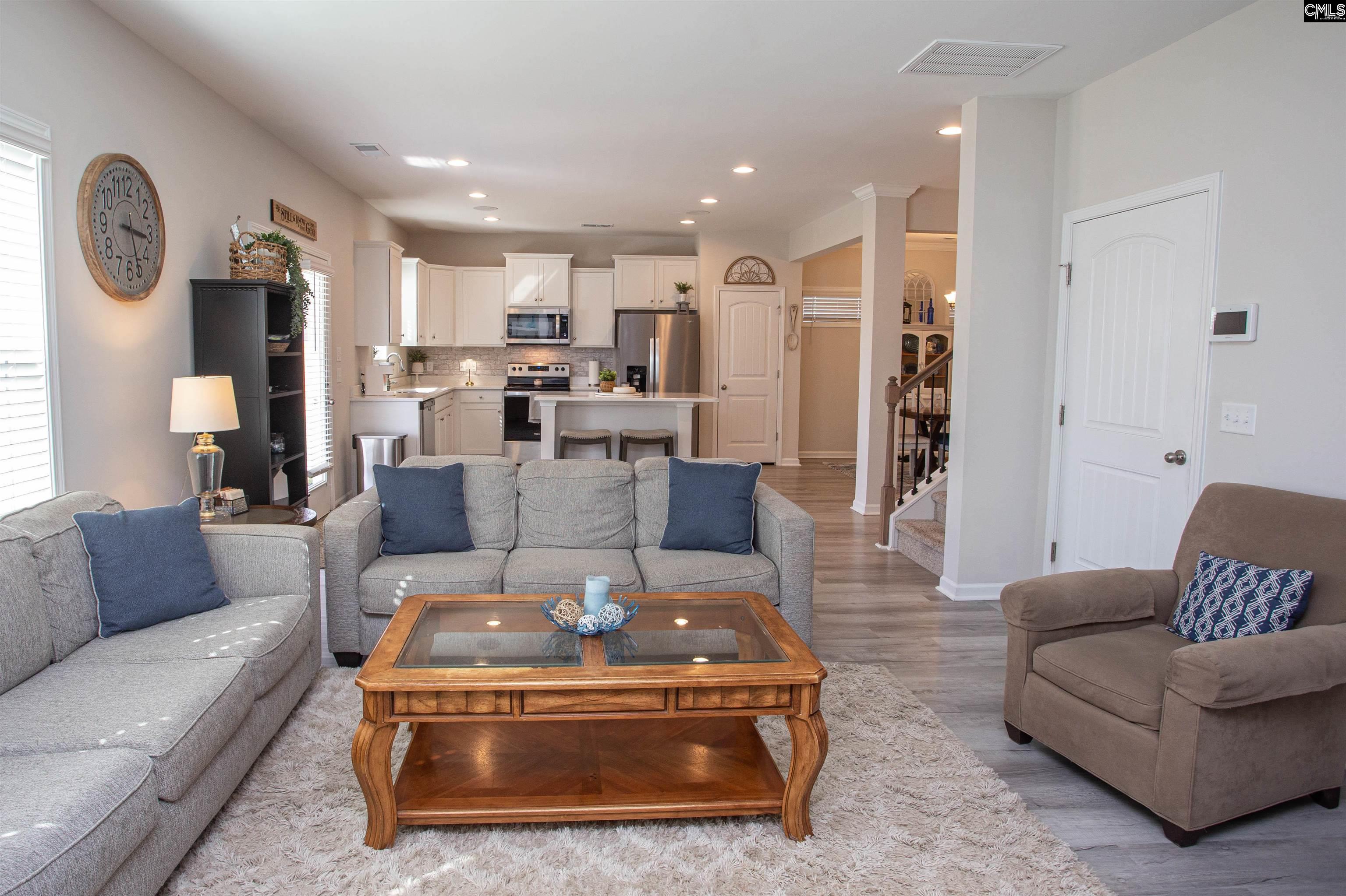 272 Shadowbrook Way Camden, SC 29020 - Photo 16 of 43 a living room with furniture and a view of kitchen
